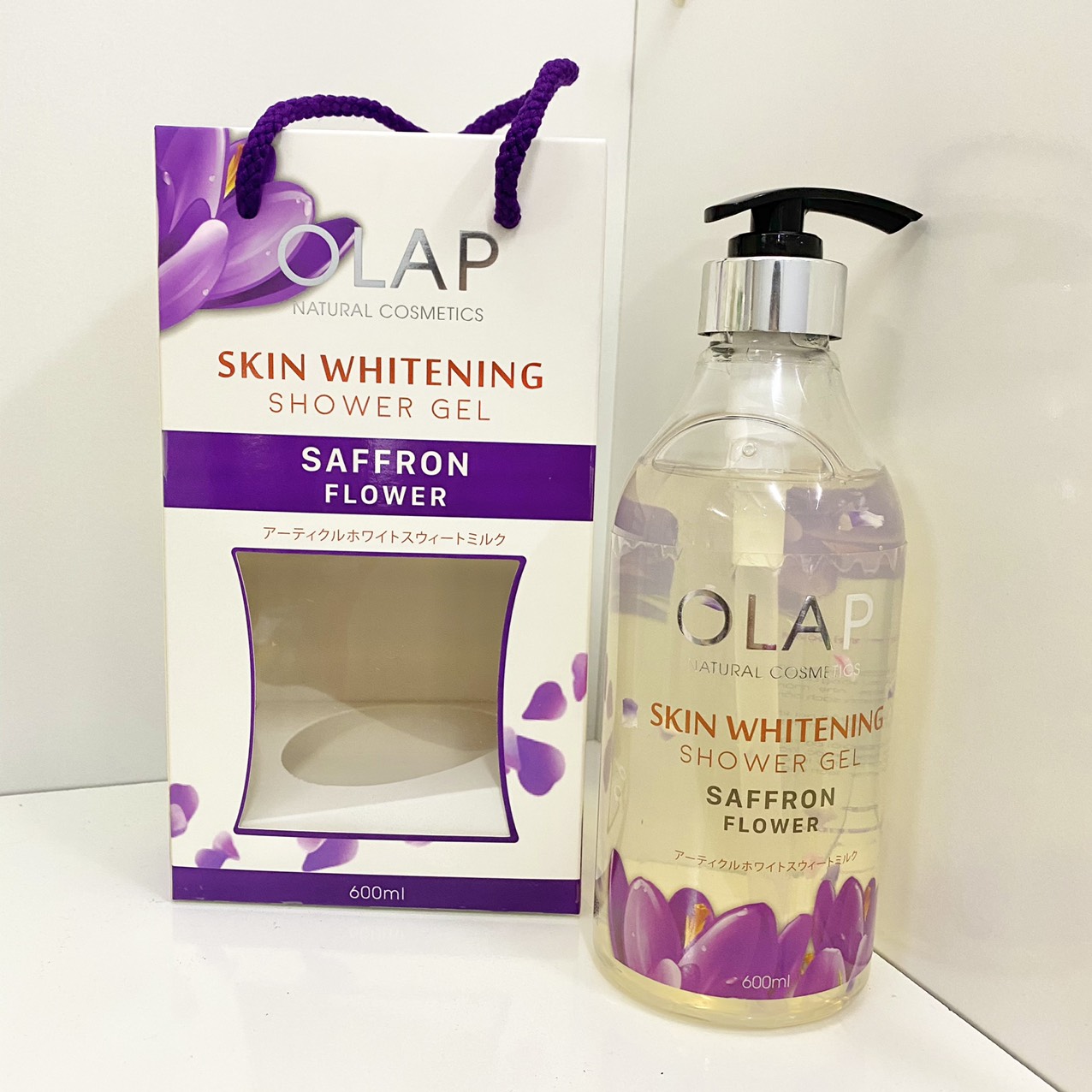 14805-z2940045962436-6e14c60973ee68156471252ff05f1e74-12.jpg Sữa Tắm Trắng Da Olap French Màu Tím 600ml - 8938519955936