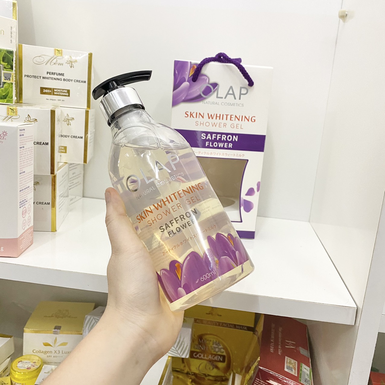 14805-z2940045971212-4779d232030df3ab432417c3d32e734f-12.jpg Sữa Tắm Trắng Da Olap French Màu Tím 600ml - 8938519955936