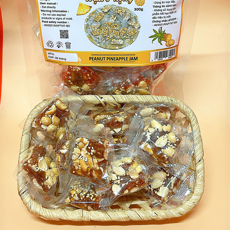 23380_z6125808197330-b8aabbf3acdffef58e7171ad0f0f625a_20241214103019-1.jpg Mứt Khóm Đậu Phộng Túi Zip 300g - MKDPTZ