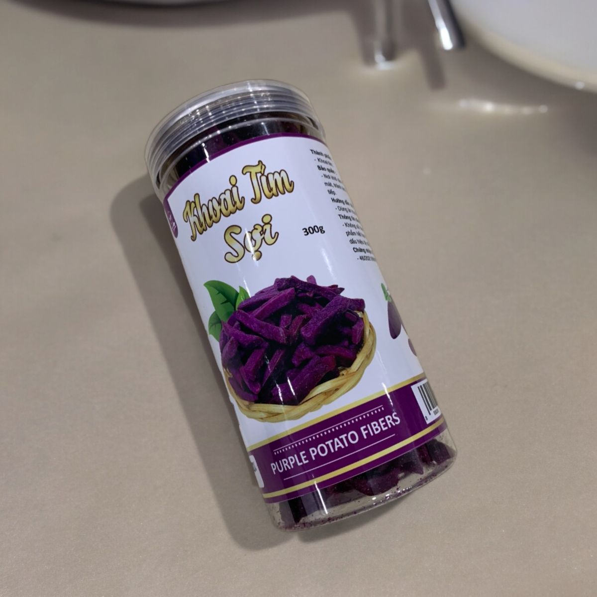 24447_z5494823765720-1c3c3612b98c916d035f6e0f3c6bb6c3-photoroom_20240601141726-1.png Khoai Lang Tím Sợi Cộng Giòn 300g - 8936208930912