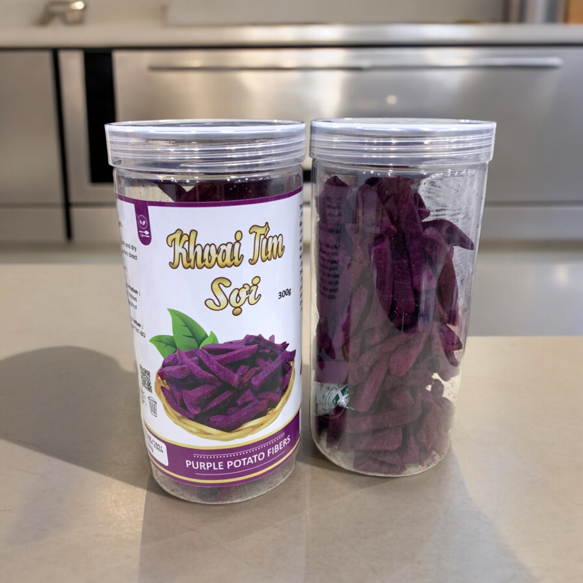 24447_z5494823835182-7fc04648971eca2e895f988f679d2564-photoroom_20240601141727-1.png Khoai Lang Tím Sợi Cộng Giòn 300g - 8936208930912