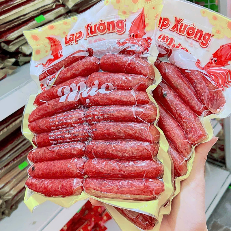 26707_4_20250905183431-1.png Lạp Xưởng Mực Thơm Ngon Túi 500g - LXMT500G